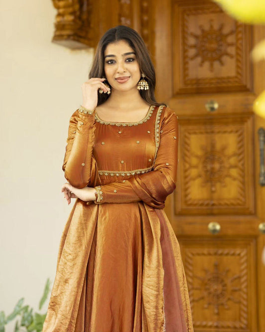 Woman in a traditional brown outfit 