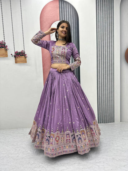 Woman wearing a purple traditional outfit Lehenga 